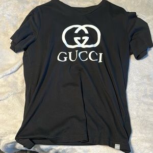 Not a real Gucci shirt just has the logo on it, worn once looks great